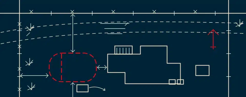 A technical drawing showing a building floor plan, dashed lines for boundaries or paths, and a red dashed oval area. There are arrows indicating directions and measurements, all on a dark blue background.